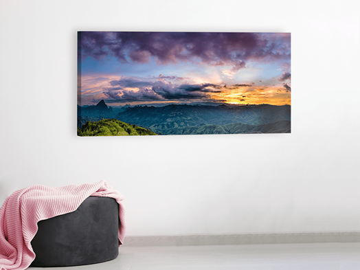Canvas Gallery Wrap featuring a vibrant sunset hanging on a wall. 