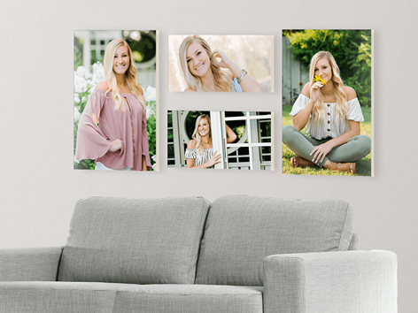 Canvas Gallery Wrap Cluster featuring senior girl images displayed on a wall behind a couch. 